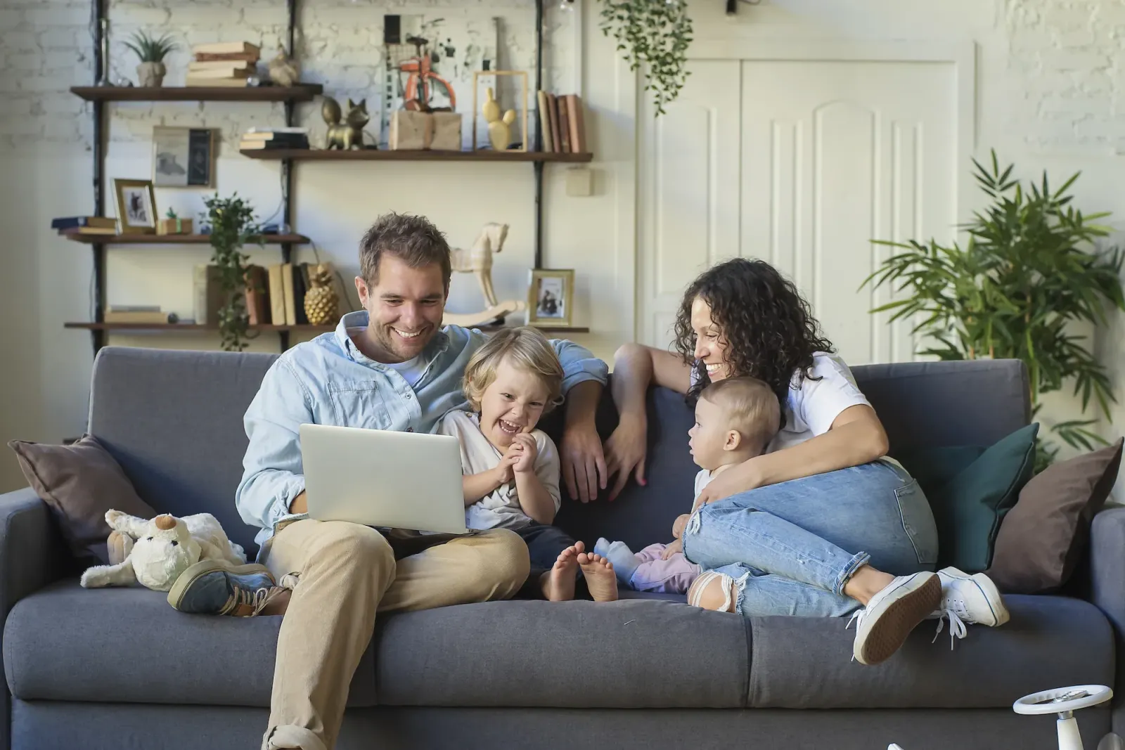 family sitting on couch